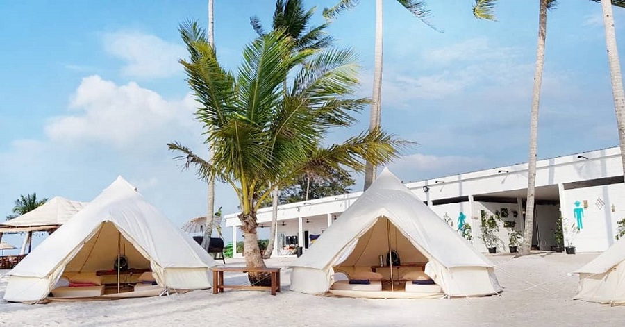 Glamping tents lining up on the beach